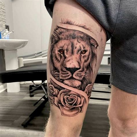 great lion tattoos|lion thigh tattoo male.